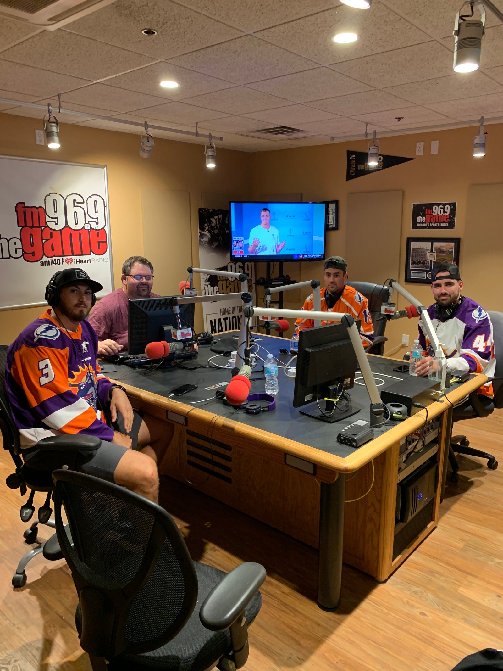 Bryan and co-hosts recording Hockey Now in the fm96.9 The Game studio