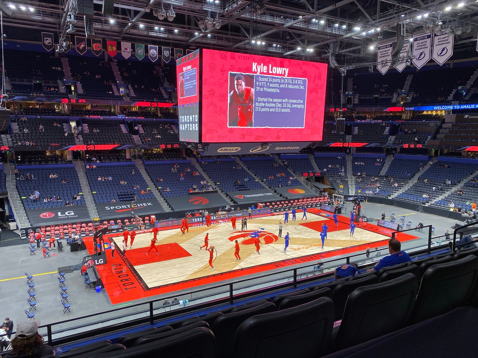 Toronto Raptors warmups on the scoreboard during a preseason game at Amalie Arena in Tampa