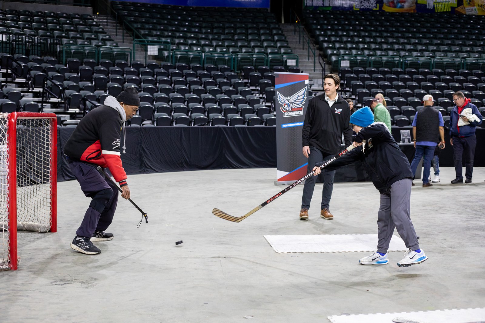 Fans playing a shootout game on the Fan Fest floor